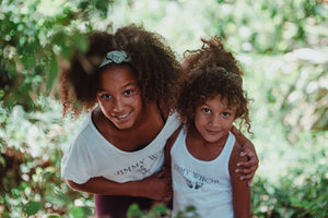 Sisters in organic cotton tank tops